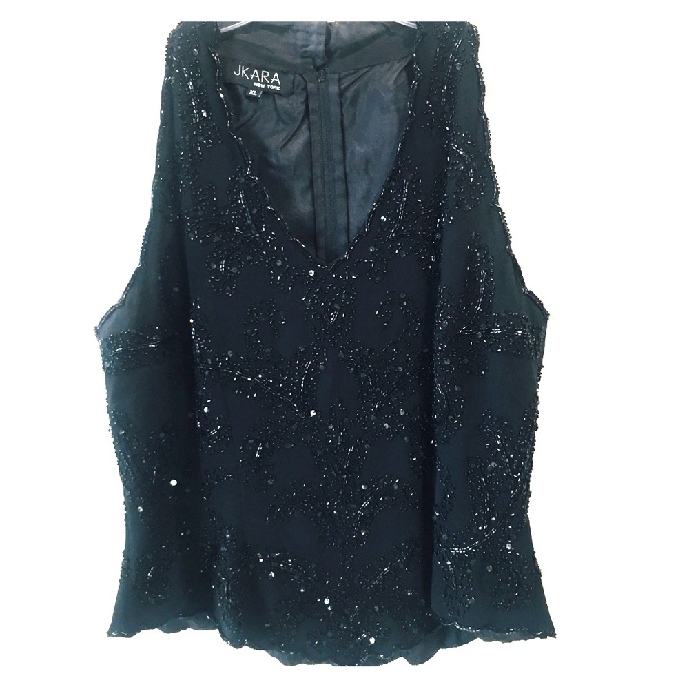 *Last month* Sequined black halter top